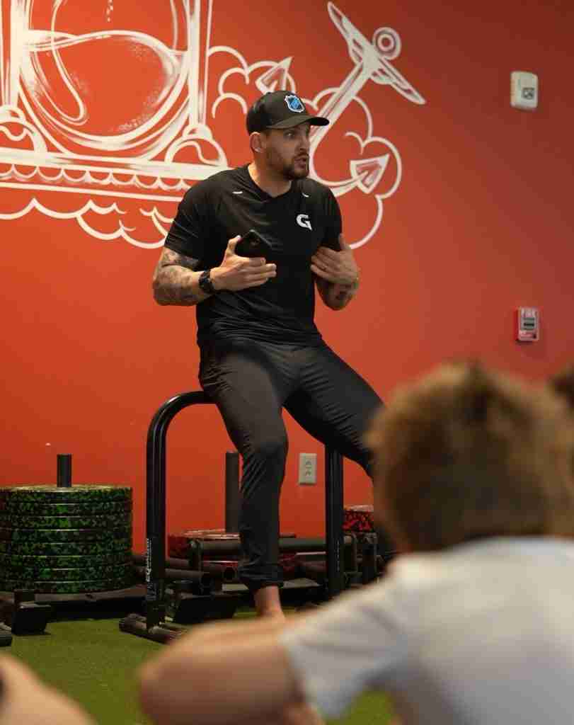 Jeff LoVecchio speaking to players in his gym